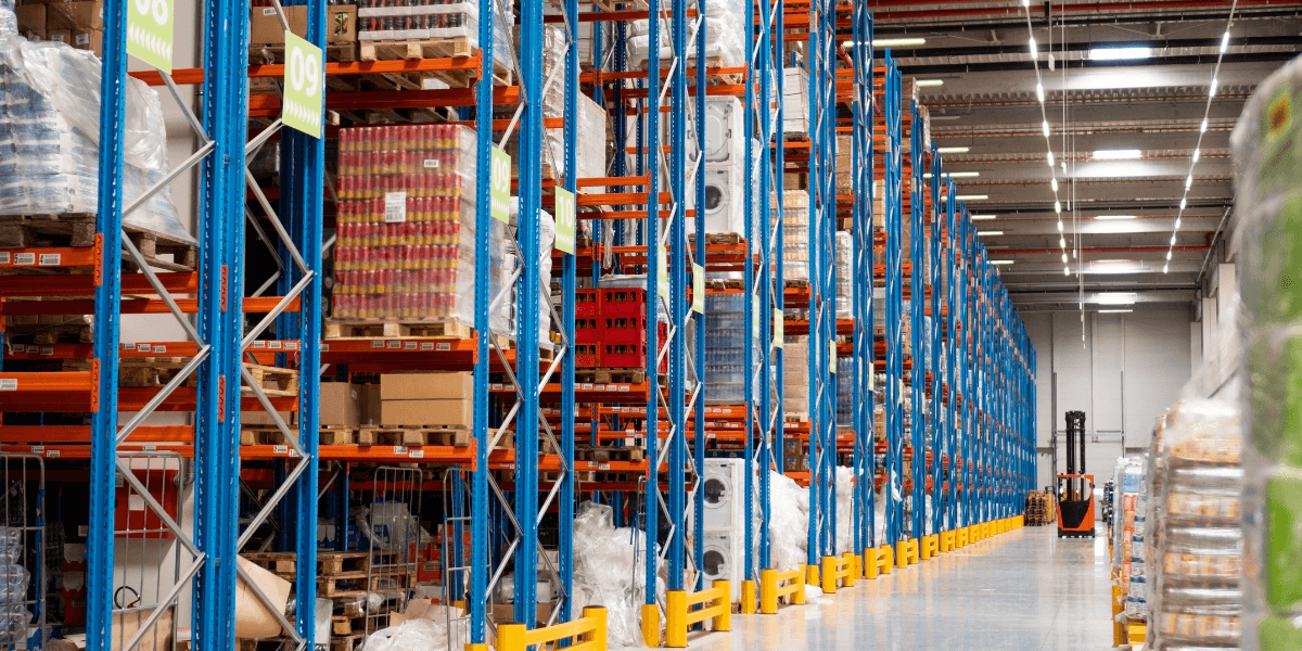 a large industrial warehouse with shelves that contain fluid sealing products